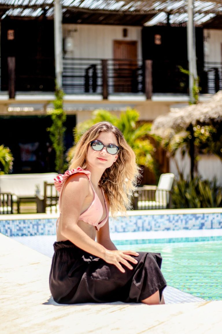 Woman in a bikini by the water