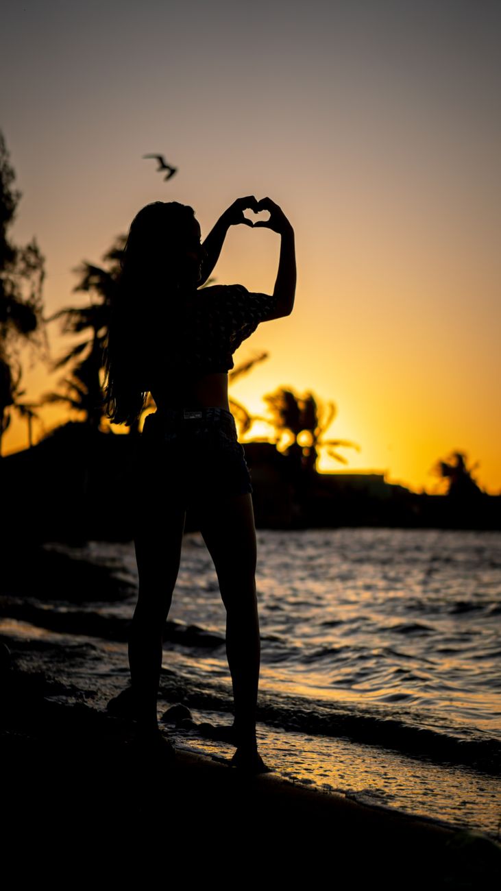 Woman in a bikini by the water