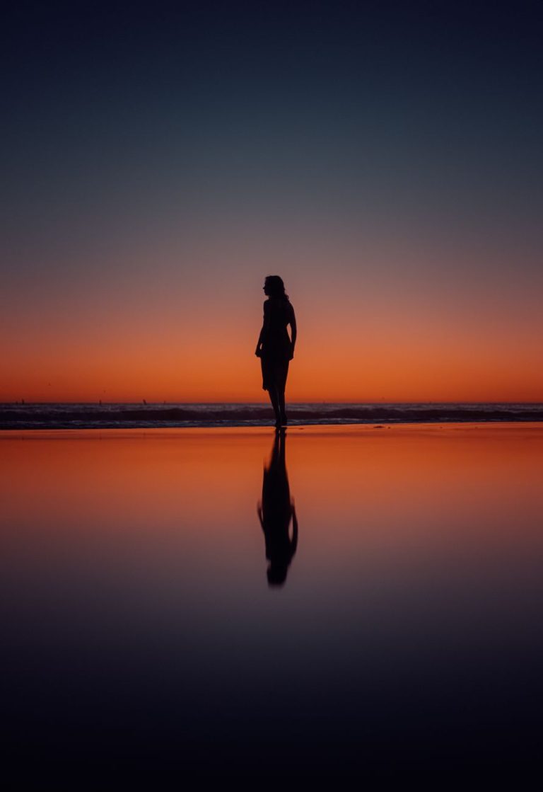 Woman in a bikini by the water